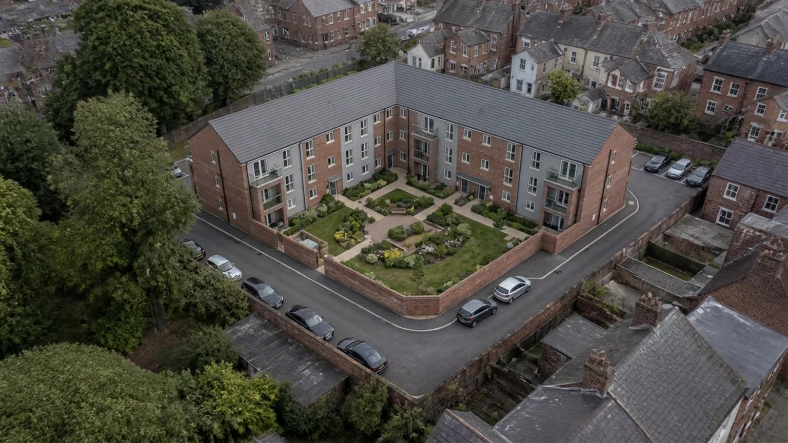 The same site shown with an illustrative residential scheme massed onto it
